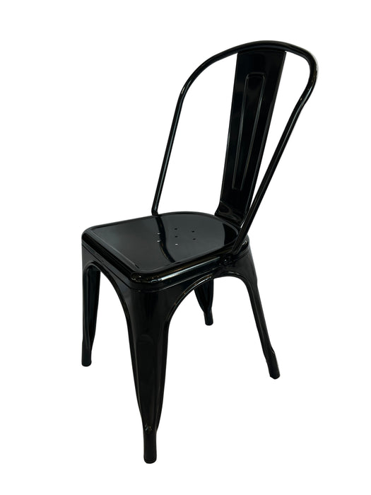 Black dining chair on a white fabric background
