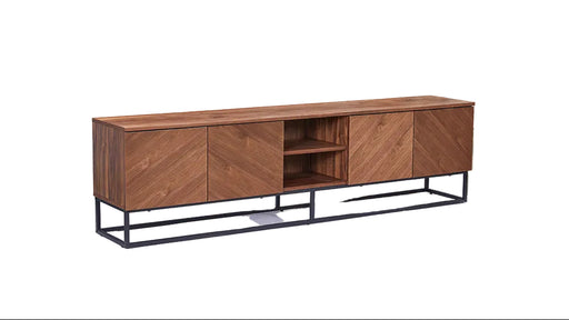 Wooden sideboard with black metal legs on a green floor, with photography equipment in the background.