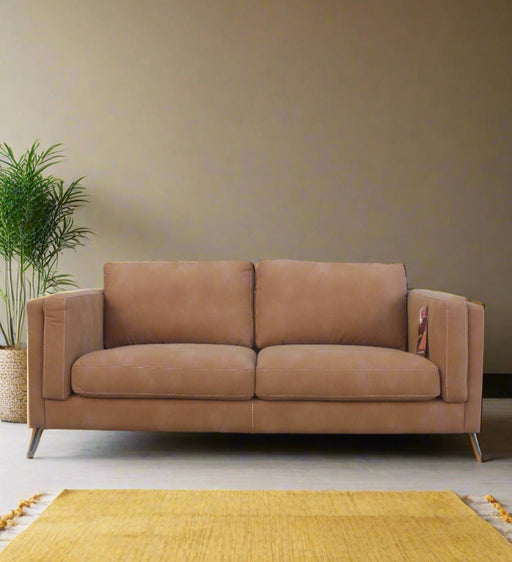 Couch in a matt mustard fabric