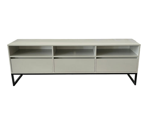 Light gray entertainment console with black legs on a white background