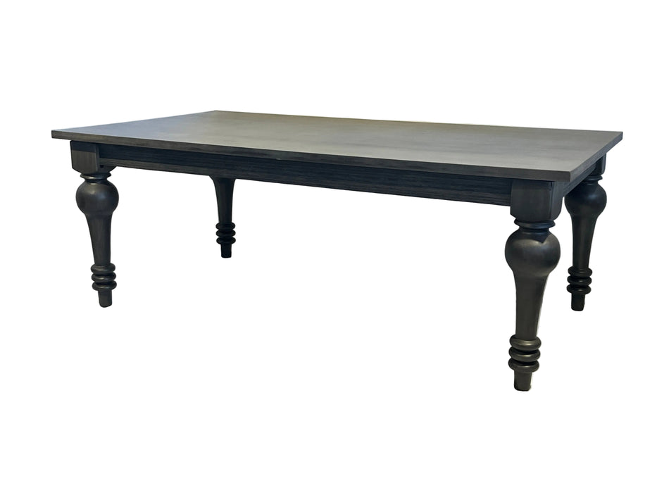 Black wooden table with turned legs on a white background