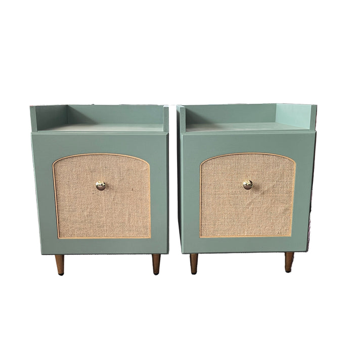 Pair of teal nightstands with woven accents on a white background