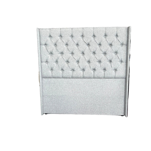 grey buttoned headboard
