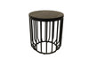 Small round table with black metal frame and wooden top on a beige background