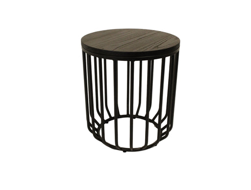 Small round table with black metal frame and wooden top on a beige background