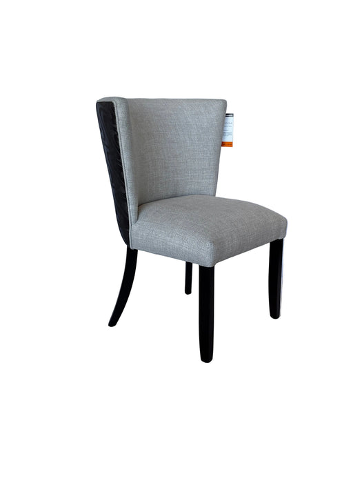 Modern chair with a white marble-like fabric