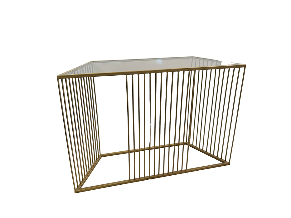 Gold metal frame on a white surface