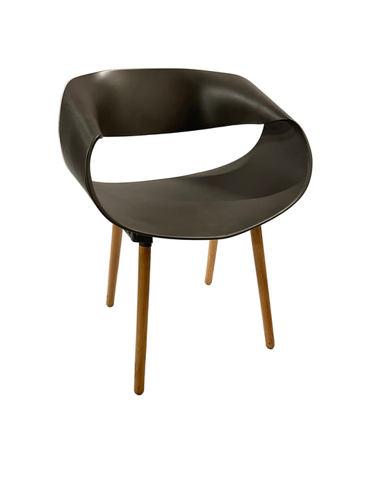 Modern black stool with wooden legs on a white background