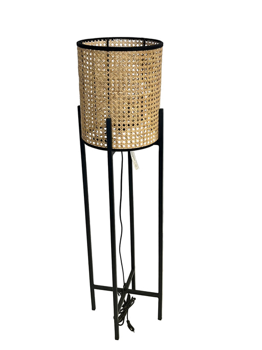 Lamp with woven design on a white background