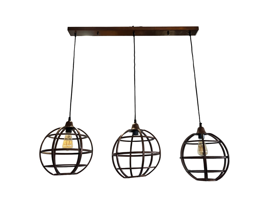 Three spherical pendant lights hanging from a wooden fixture against a white backdrop.