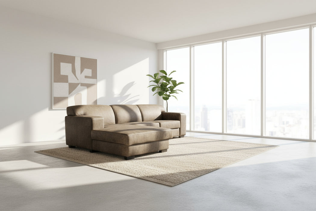 Brown sectional sofa in a room with white draped fabric