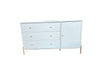 White dresser with gold legs in a bedroom setting