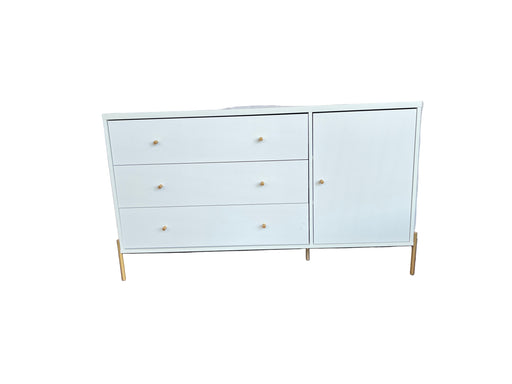 White dresser with gold legs in a bedroom setting
