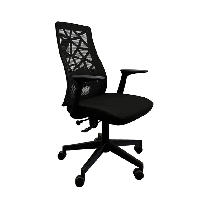 Black office chair with white protective cover on a gray floor.
