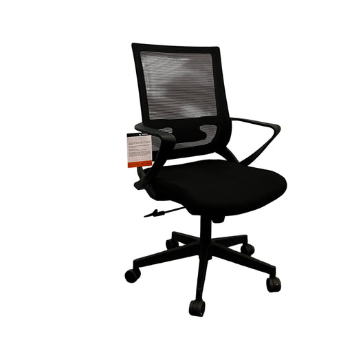 Black office chair on a white sheet with a gray floor.