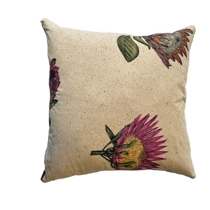 Decorative pillow with floral design on a textured surface