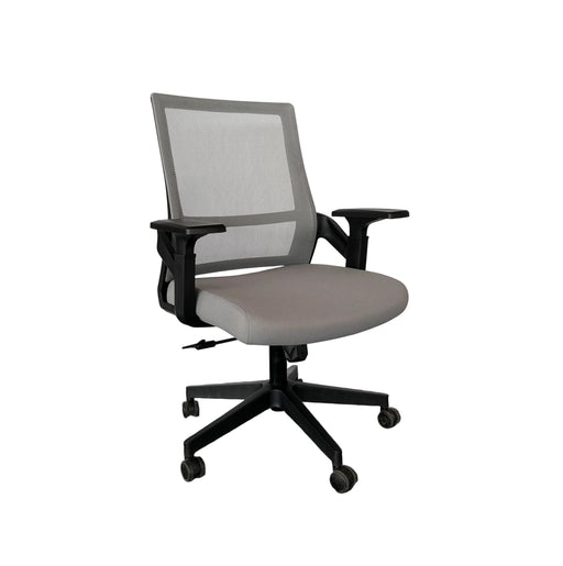 A gray mesh-back office chair with a black five-star base and casters, photographed indoors against a draped white fabric backdrop.