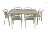 Outdoor furniture set with a table and chairs on a gray carpeted floor.