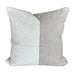 Gray textured pillow on a brown sofa