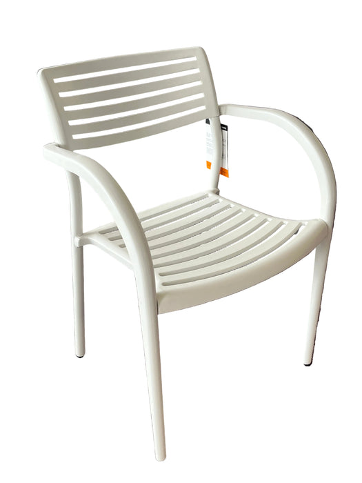 White metal chair on a purple carpeted floor