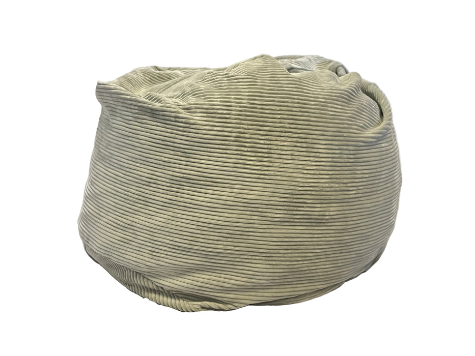 Green textured bag on a white background