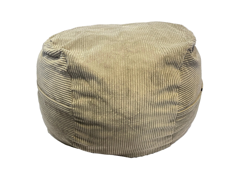 Beige corduroy ottoman on a white background