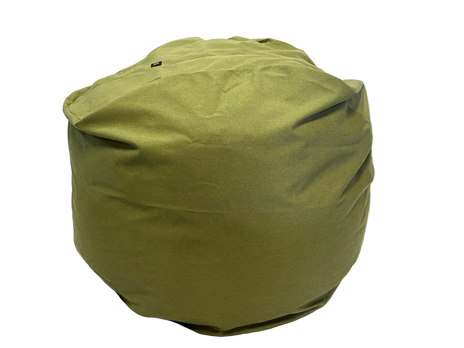 Green bean bag chair on a white draped surface