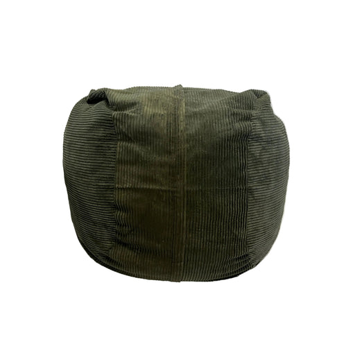 Green cushion on a white surface