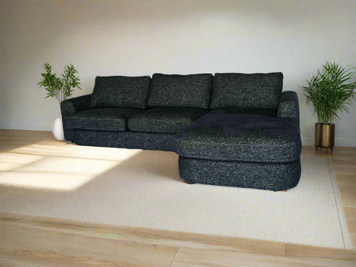 Gray sectional sofa on a white backdrop