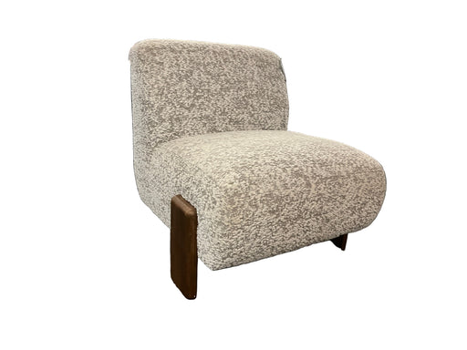 Textured armchair in a furniture store setting