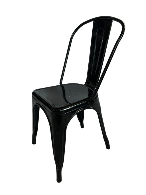 Black dining chair on a white fabric background