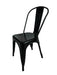 Black dining chair on a white fabric background