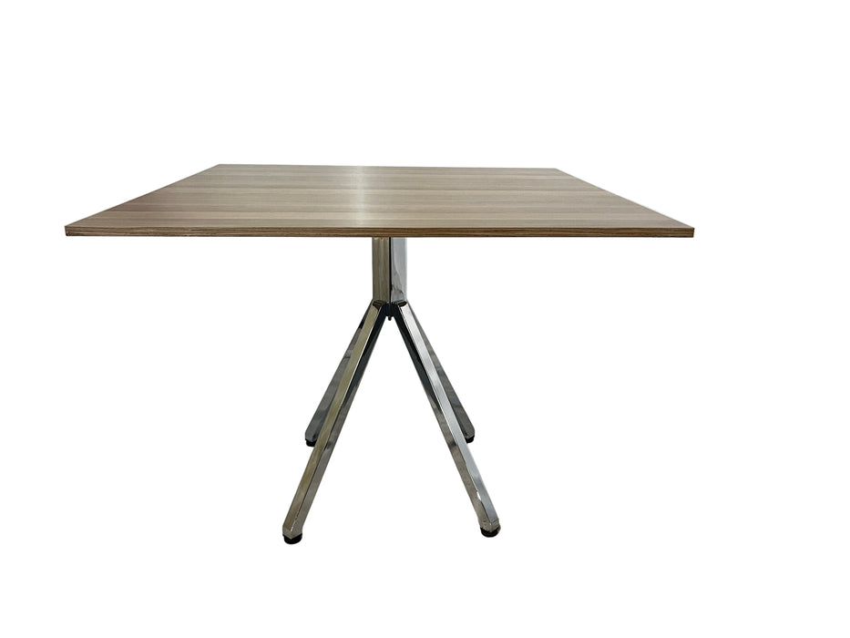 Wooden table with metal legs on a white background