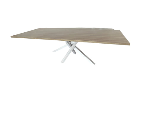 Table with white legs on a white draped background