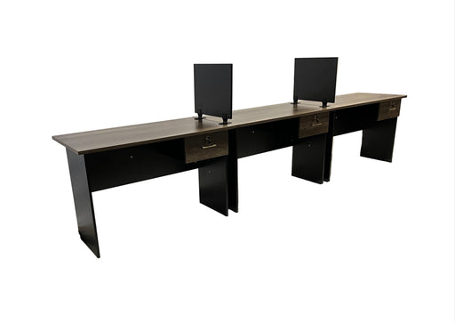 Long office desk with two computer monitors on a white background