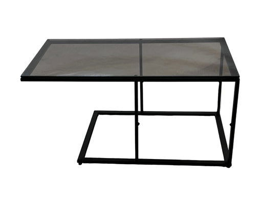 Glass coffee table with black metal frame on a white background