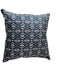 Decorative pillow with black and white pattern on a beige background
