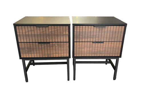 Two nightstands with woven design on a carpeted floor