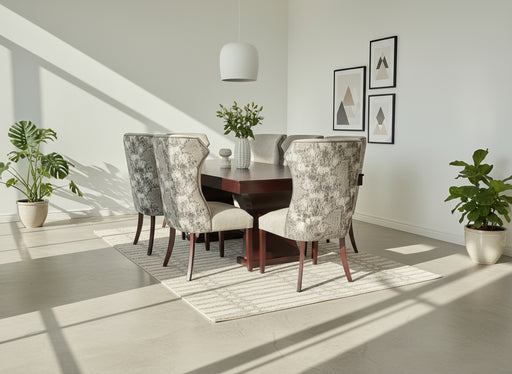 Dining table set with patterned chairs against a white backdrop
