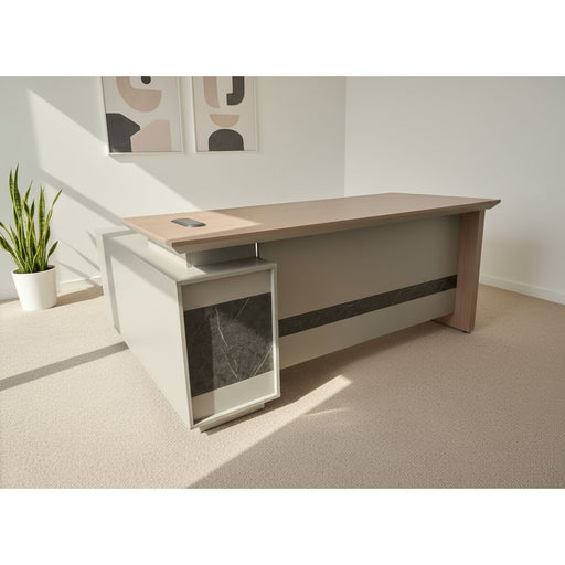 Beige office desk with a white curtain in the background