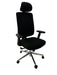 Black office chair on a white draped background