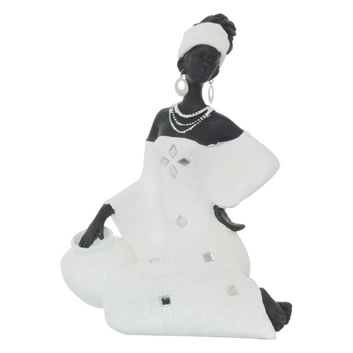 MOTSWARI LADY SITTING WITH POT 20 TRAN